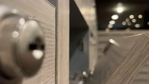 Wooden mailboxes close automatically slowly with blurred rows of mailboxes Stock Footage 230095756