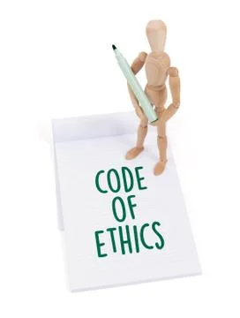 Wooden mannequin writing - Code of ethics 写真素材