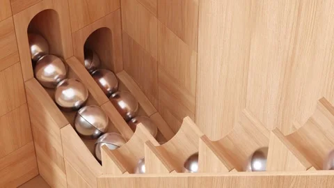Wooden marble run machine. Rolling ball sculpture. Marble race toy. Stock Footage 256041451
