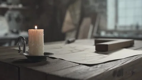Wooden measuring square tool on a desk inside a medieval workshop Stock Footage 338990925