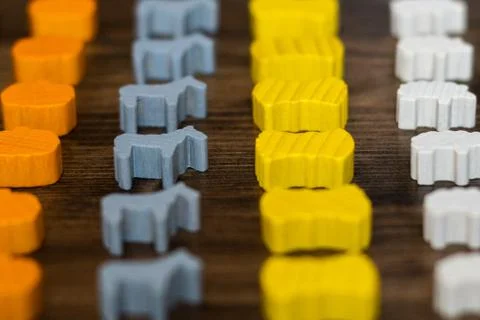 Wooden meeple from farming board game Stock Photos