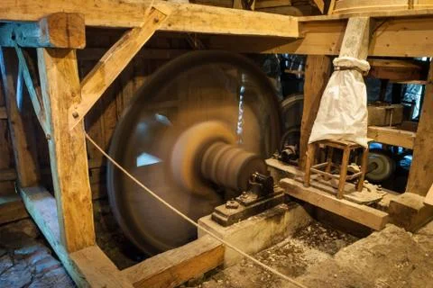 Wooden mill inside Stock Photos