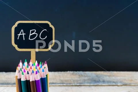 Wooden mini blackboard label with message ABC Stock Photos