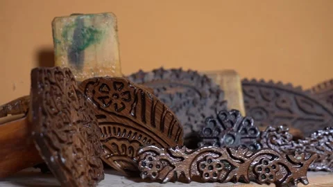 Wooden molds, cast used to pattern Kalagai Kalaghayi silk headscarves Stock-Footage 248830694