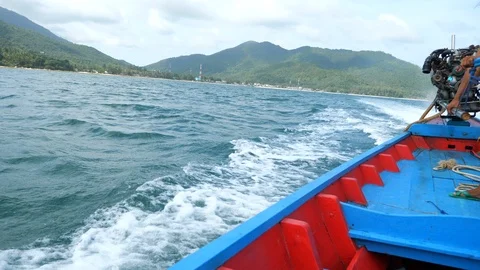 Wooden motor boat floating Stock Footage 97783353