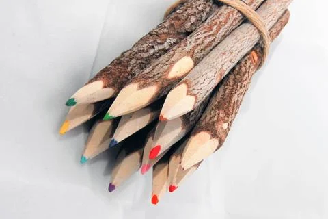 Wooden multi colored pensils Sharpened multi colored pencils on white back... 스톡 사진