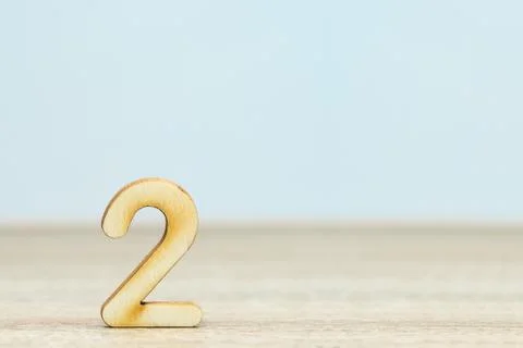 Wooden numeric on table , number two Stock Photos