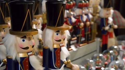 Wooden Nutcracker showcase with Christmas decorations 스톡 동영상 99477653