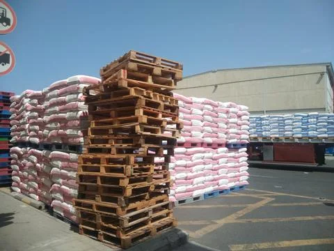 The wooden pallets stack view with the red flour view Stock Photos