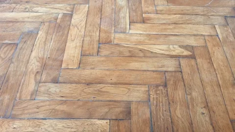 Wooden Parquet Floor in Herringbone Pattern with Natural Grain Stock Footage 344756958