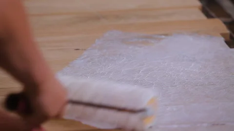 The wooden part is smeared with glue usi... | Stock Video | Pond5