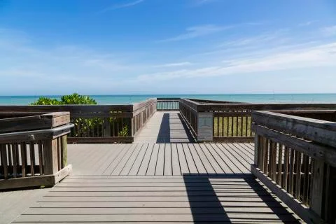 Wooden path to the beach Stock Photos