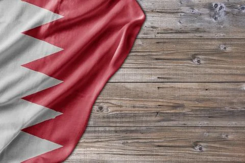Wooden pattern old nature table board with Bahrain flag Stock Photos