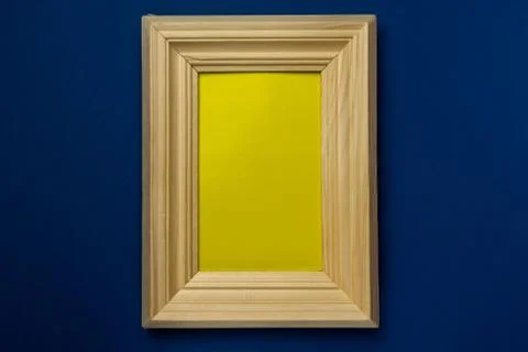 Wooden photo frame on solid background Stock Photos