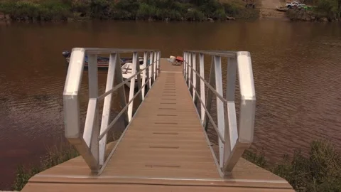 Wooden pier in a river Stock Footage 154406686