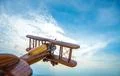 The wooden plane on the blue sky background Photo