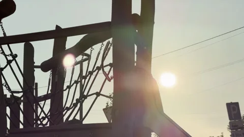 Wooden Playground Structure Stands Empty Under Glowing Golden Hour Sunset Stock Footage 335112770