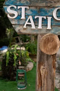 Wooden pointer and lantern Foto stock