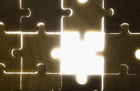 Wooden puzzle and backlight background Wooden puzzle and backlight backgro... Stock Photos