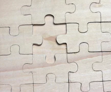 Wooden puzzles. Stock Photos