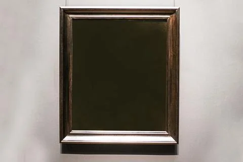 Wooden rectangular frame covered with a gray blurred background. Advertisin.. Foto stock