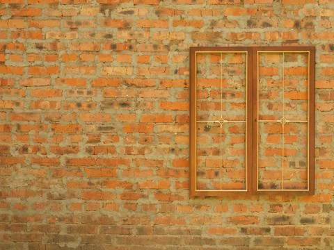 Wooden rectangular frame with a metal grill on the background of an old brick Stock Photos