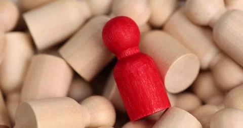Wooden red figurine is different from crowd Stock Footage 250161010
