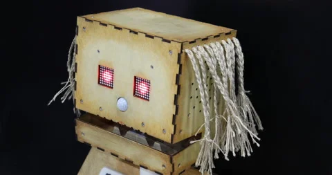 Wooden robot with artificial intelligence and red eyes Stock Footage 106296877