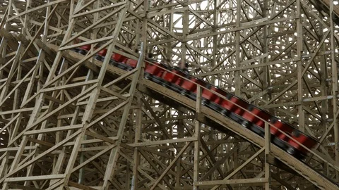 Wooden rollercoaster structure with a wagon drives through it in china Video stock 105865609