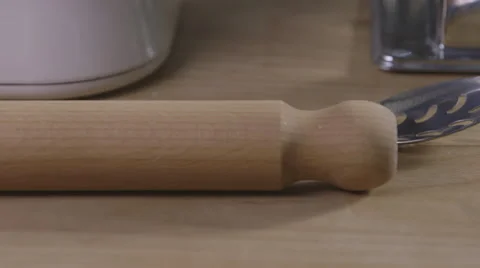 Wooden rolling pin Stock Footage 64056090
