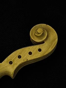 Wooden Scroll,part of violin,put on background Stock Photos