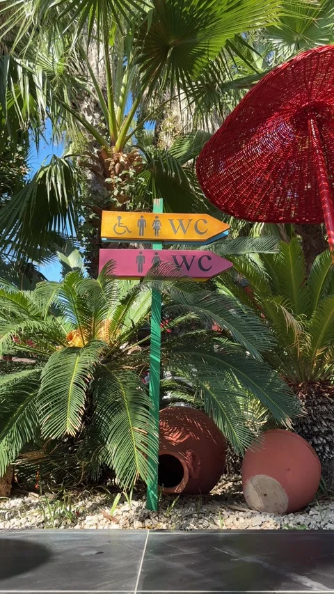 A wooden sign showing men's and women's ... | Stock Video | Pond5