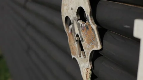 Wooden skull it is hanging on a fence close-up Stock Footage 59369458