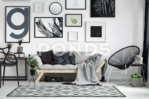Wooden sofa with pillows Stock Photos