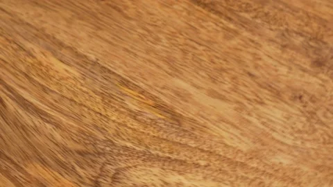 Wooden Spinning Mango Surface. Wooden Abstract Rotating Mango Background. Wooden Stock Footage 156243953