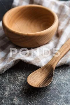 Wooden spoon and bowl. Stock Photos