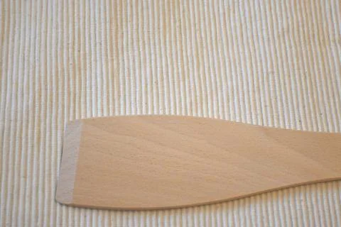 Wooden spoon on a light background 스톡 사진