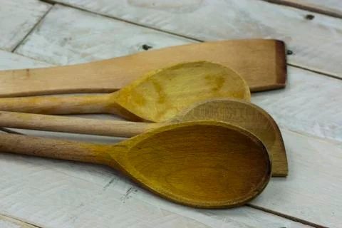 Wooden spoon on a rustic background Stock Photos