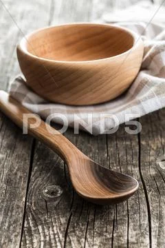 Wooden spoons and bowl. Stock Photos