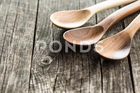 Wooden spoons and bowl. Stock Photos