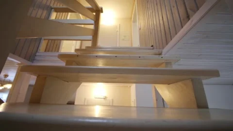 Wooden staircase to the second floor of the Stock Footage 299636801