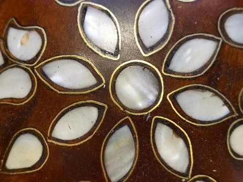 A wooden star pattern decorated with shell Foto stock