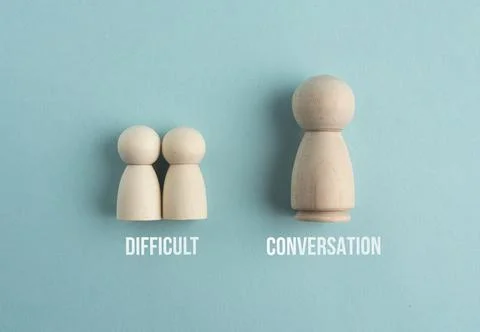 Wooden stick with the word DIFFICULT CONVERSATION. difficult concept of con.. Stock Photos