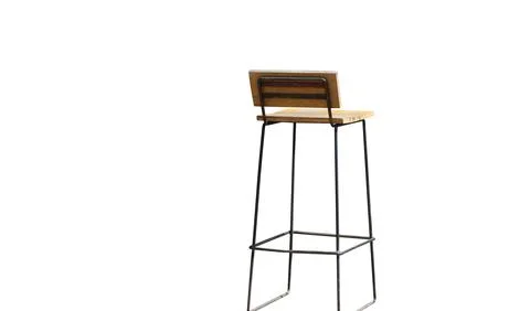 The wooden stool simple designed, old barstool on isolated background Stock Photos