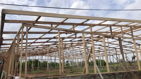 A wooden structure built for a poultry, Shot in Accra-Ghana, June 21,2025. Stock Footage 312485889