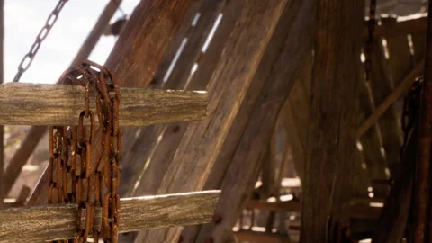 Wooden structure with chains at a construction site in daylight Stock Footage 343541907