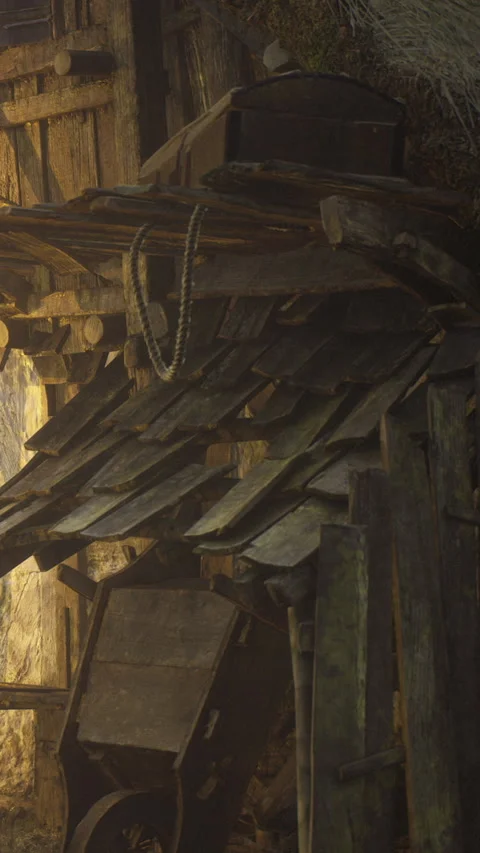 Wooden structure in a rustic setting with natural light shining through Stock Footage 333567138