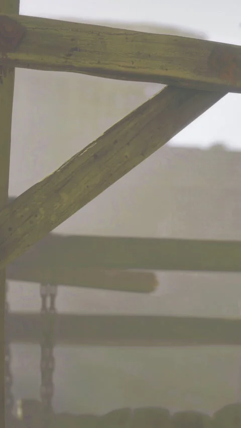 Wooden structure seen in misty background during early morning light Stock Footage 332209113