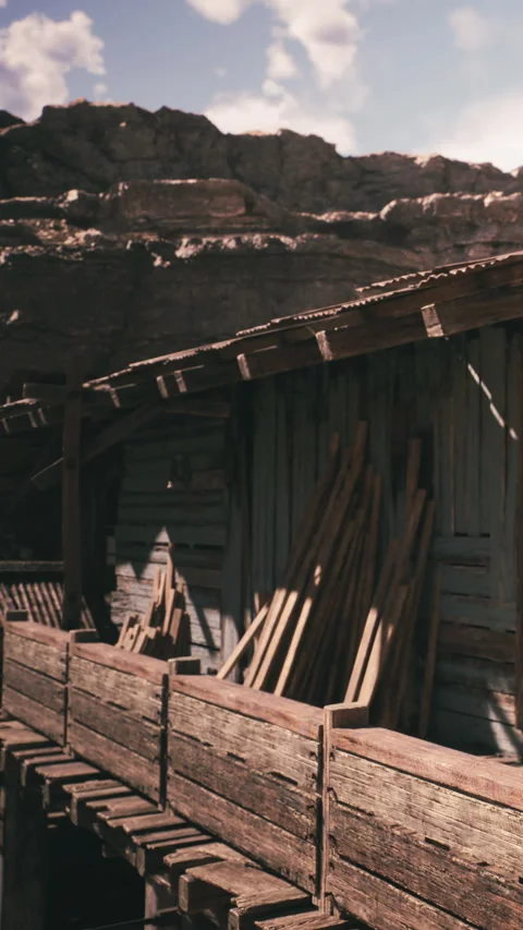 Wooden structure with stacked materials in a quarry area during daytime Stock Footage 342125228