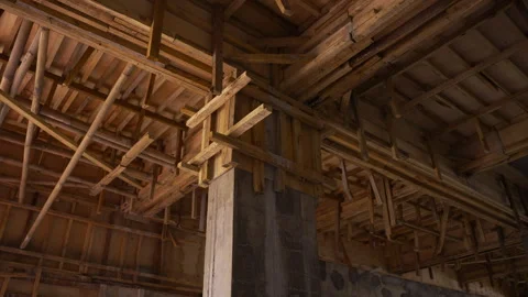 Wooden support on ceiling, scaffolding at construction site. Stock Footage 272589533
